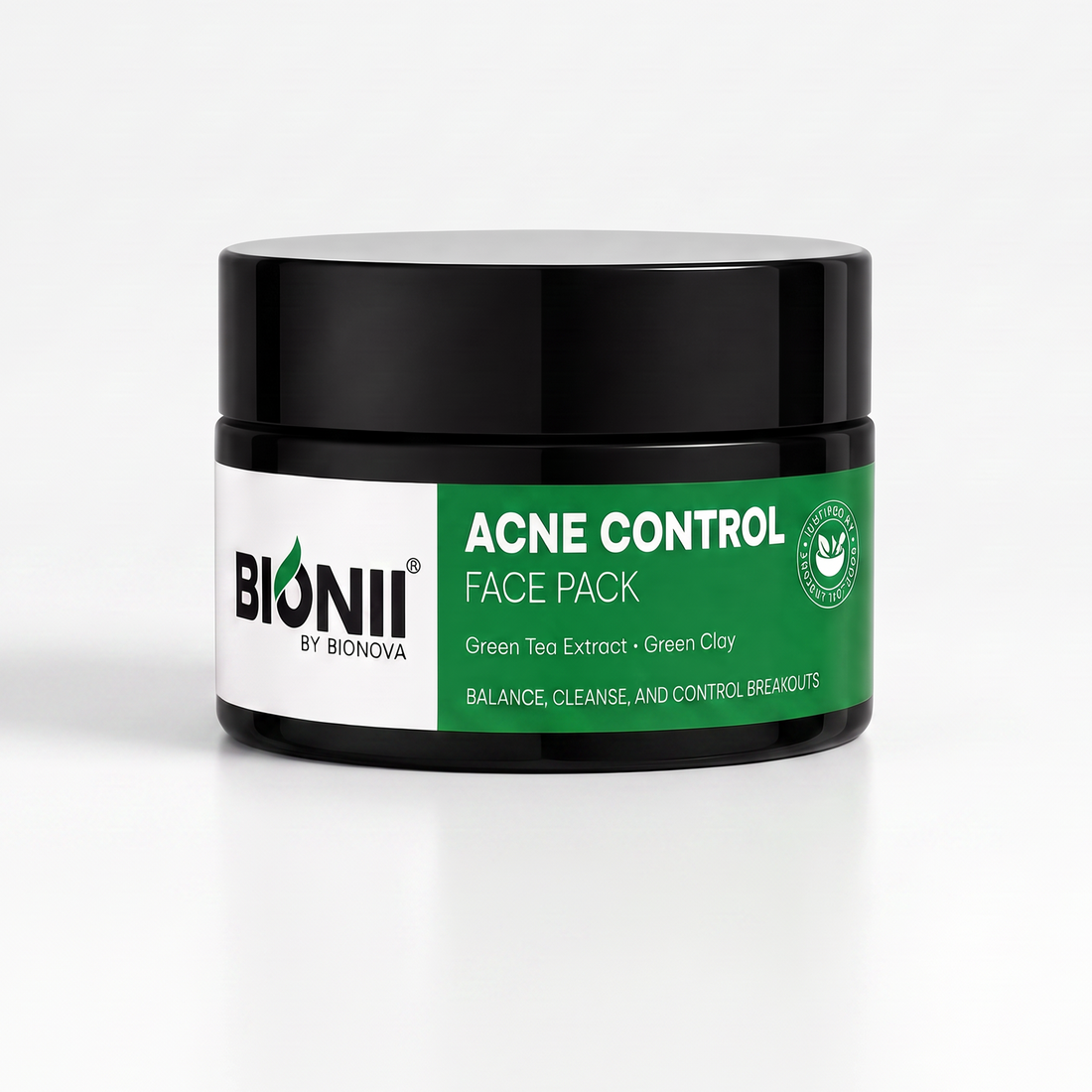 A black plastic jar of Bionii by Bionova Acne Control Face Pack with a green and white label, set against a clean white background.